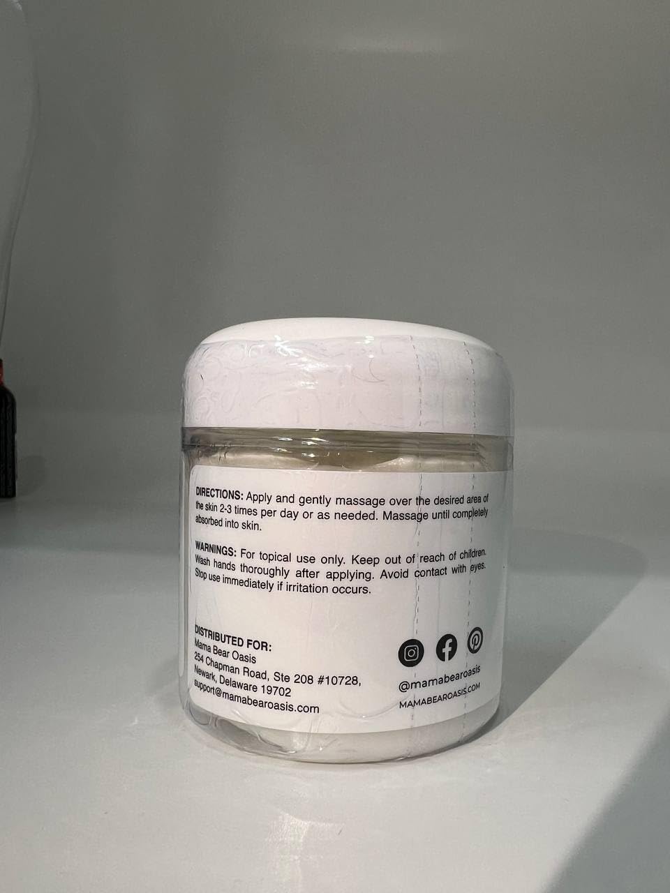 Mama Bear Oasis applied to foot demonstrating soothing, non-greasy absorption