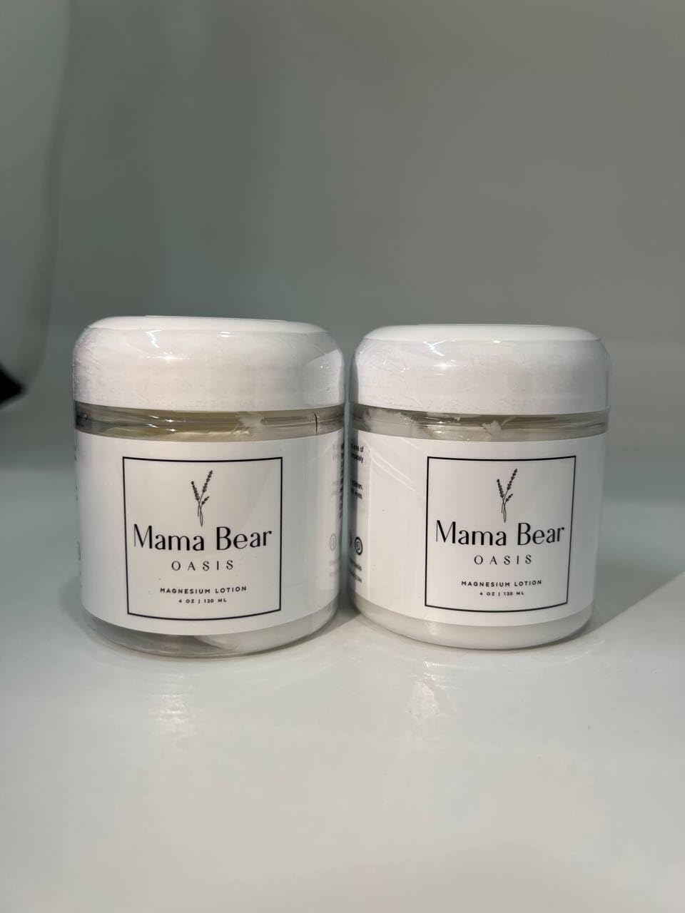 Mama Bear Oasis cream texture closeup highlighting smooth, fast-absorbing finish