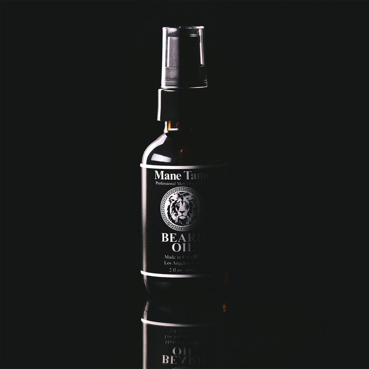 Mane Tame oil texture drop on hand highlighting non-greasy absorption benefit