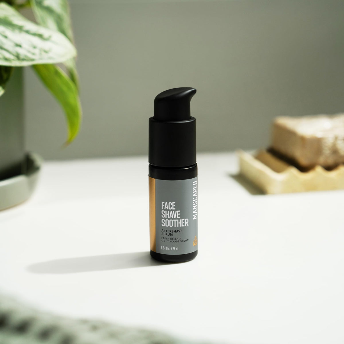 MANSCAPED label detail highlighting vegan and paraben-free benefits