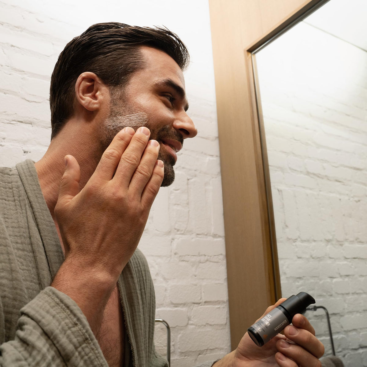 MANSCAPED on bathroom shelf in daily routine setting signaling easy integration