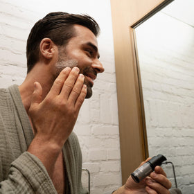 MANSCAPED on bathroom shelf in daily routine setting signaling easy integration