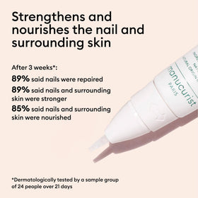 Manucurist pen being applied to cuticle in hand for quick on-the-go care