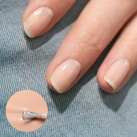 Manucurist brush and cap detail displaying precise application control