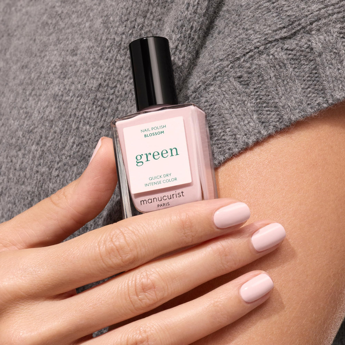 Manucurist Blossom swatch on fingers showing opaque coverage benefit