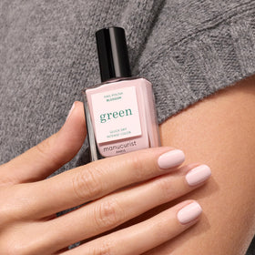 Manucurist Blossom swatch on fingers showing opaque coverage benefit