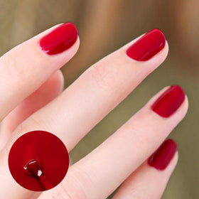 Manucurist brush and cap close-up for precise application and control