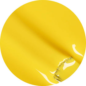 Manucurist Gold Button on hands in sunlight showing cheerful summer manicure look