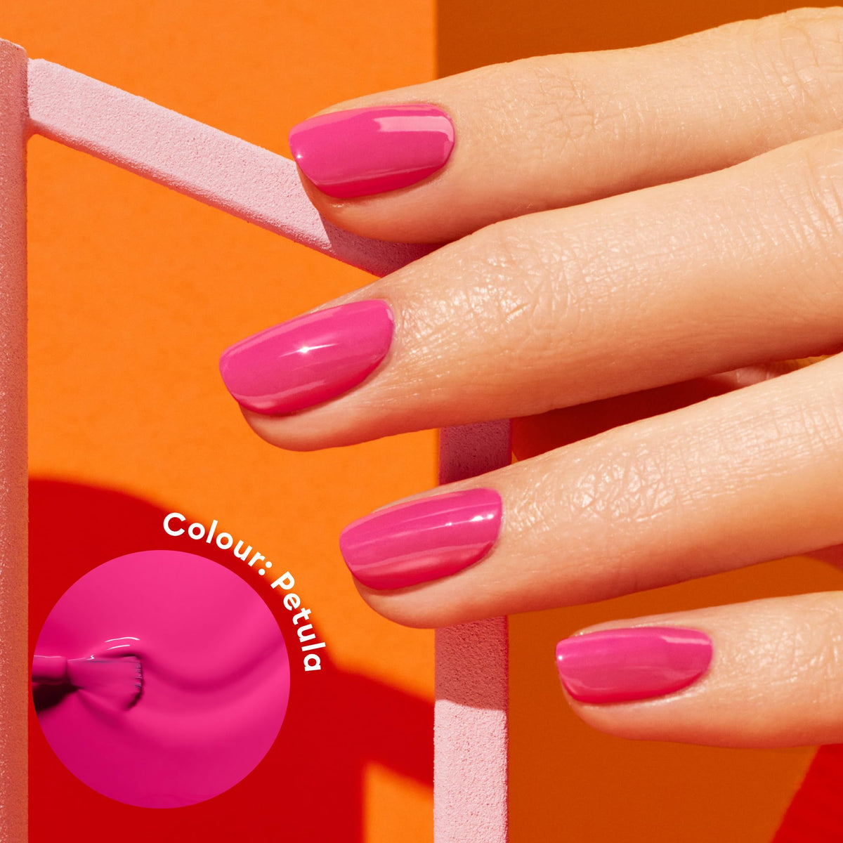 Manucurist Pétula brush pulled from cap demonstrating smooth, even application benefit
