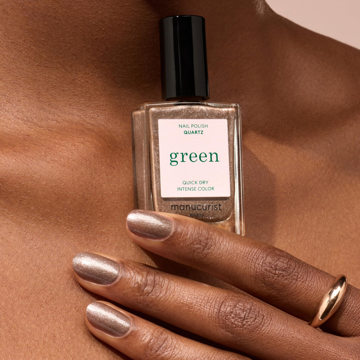 Manucurist swatch on nails showing opaque glitter finish and color payoff