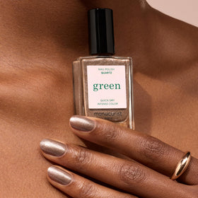 Manucurist swatch on nails showing opaque glitter finish and color payoff