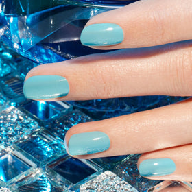 Manucurist Riviera swatch strip illustrating opaque two-coat coverage and true turquoise shade