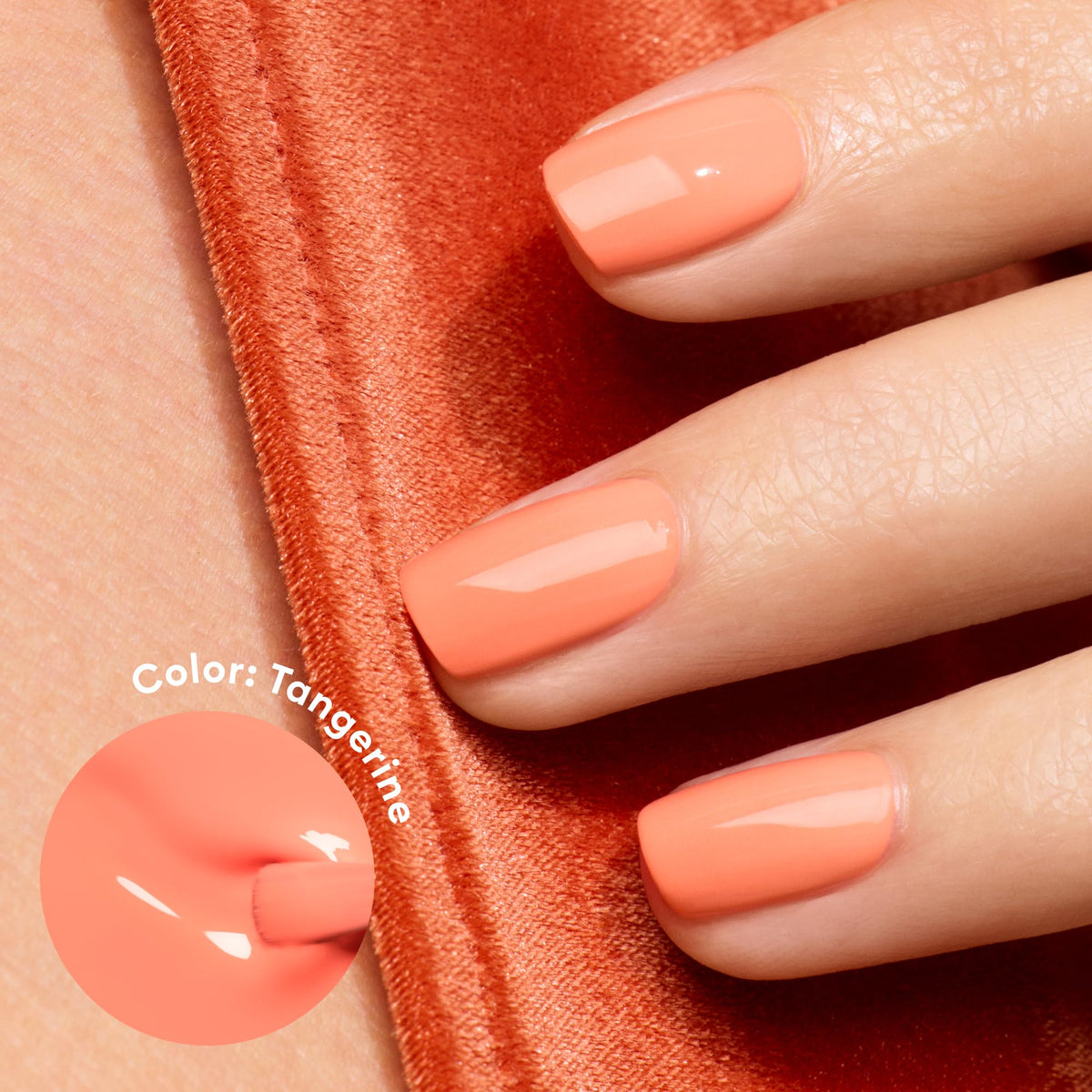 Manucurist brush applying tangerine ensuring smooth, streak-free application