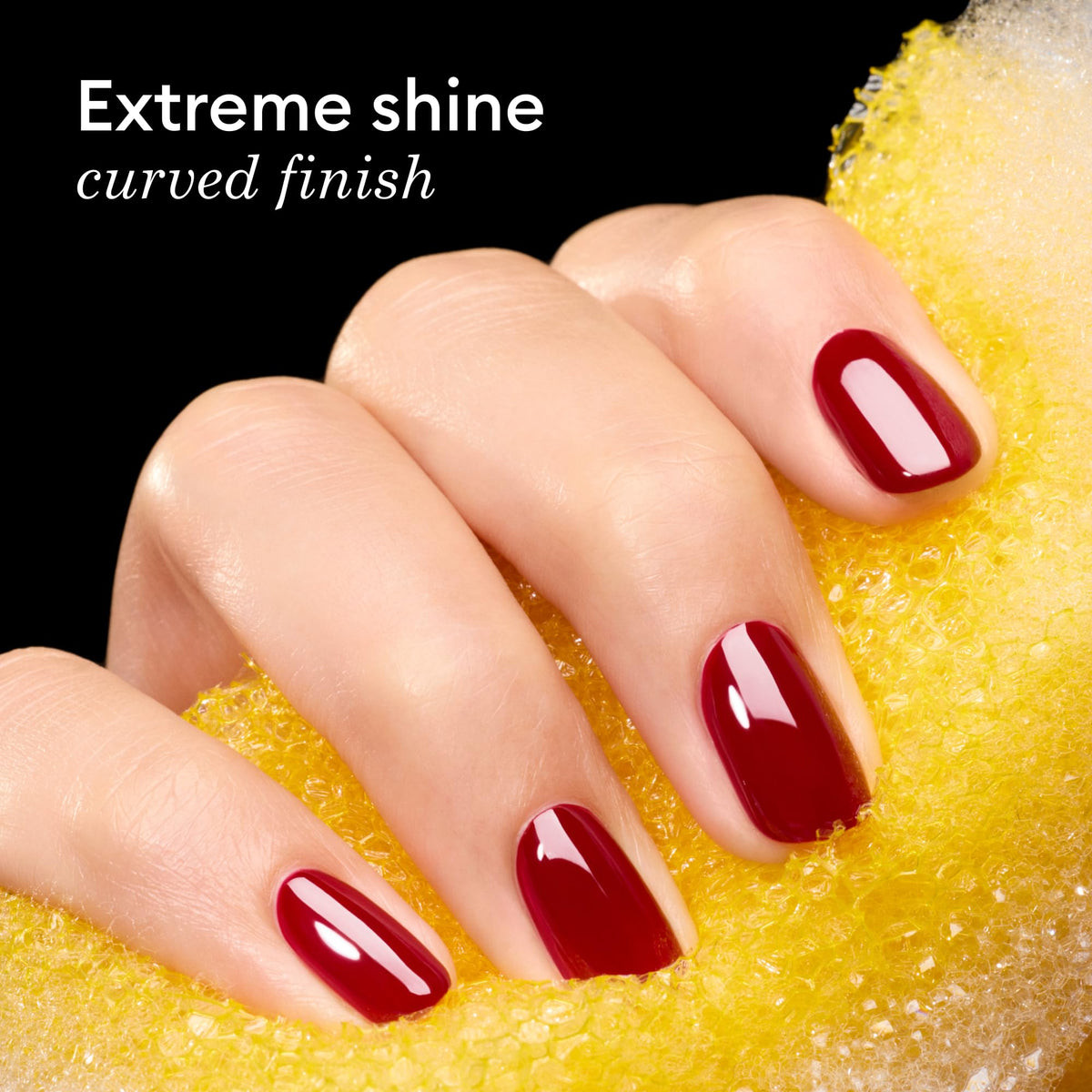 Manucurist on manicured hands demonstrating plump gel effect and long-lasting wear
