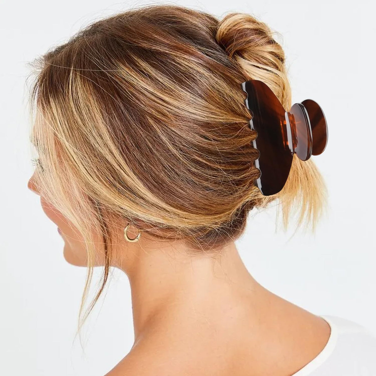 MAORULU used to secure a casual bun showing versatility for everyday styling