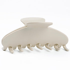 MAORULU front view of cream-white claw clip highlighting design and hold