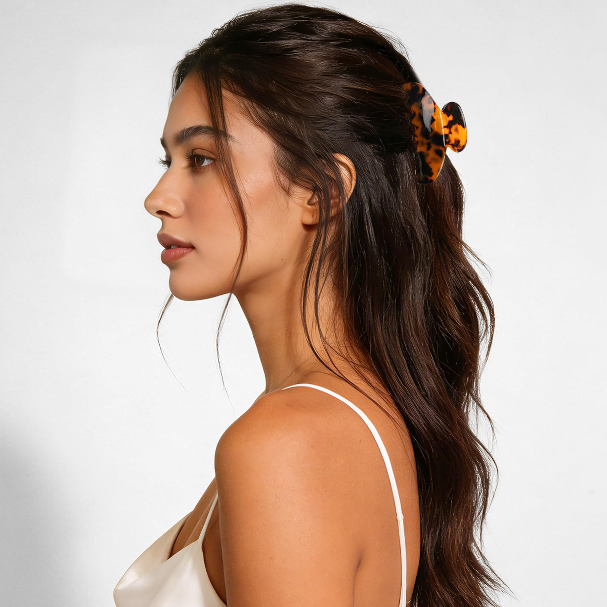 MAORULU styled half-up bun demonstrating secure hold and polished look