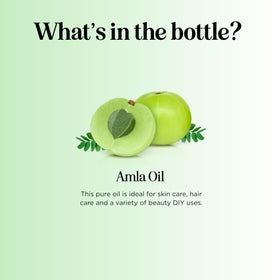 Maple Holistics amla oil drops on hands demonstrating easy application