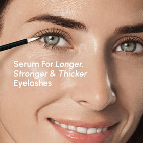 MAREE application brush poised to apply serum for precise results