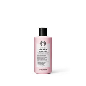 Maria Nila bottle front view showing product and glossy finish benefit