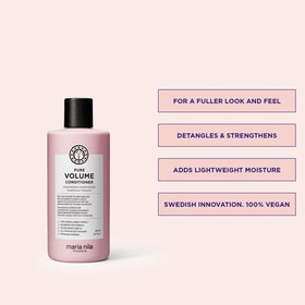 Maria Nila conditioner texture on hand highlighting smooth, lightweight feel
