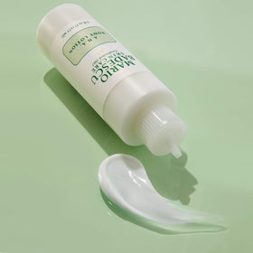 Mario Badescu bottle next to common objects showing 6 fl oz size for scale