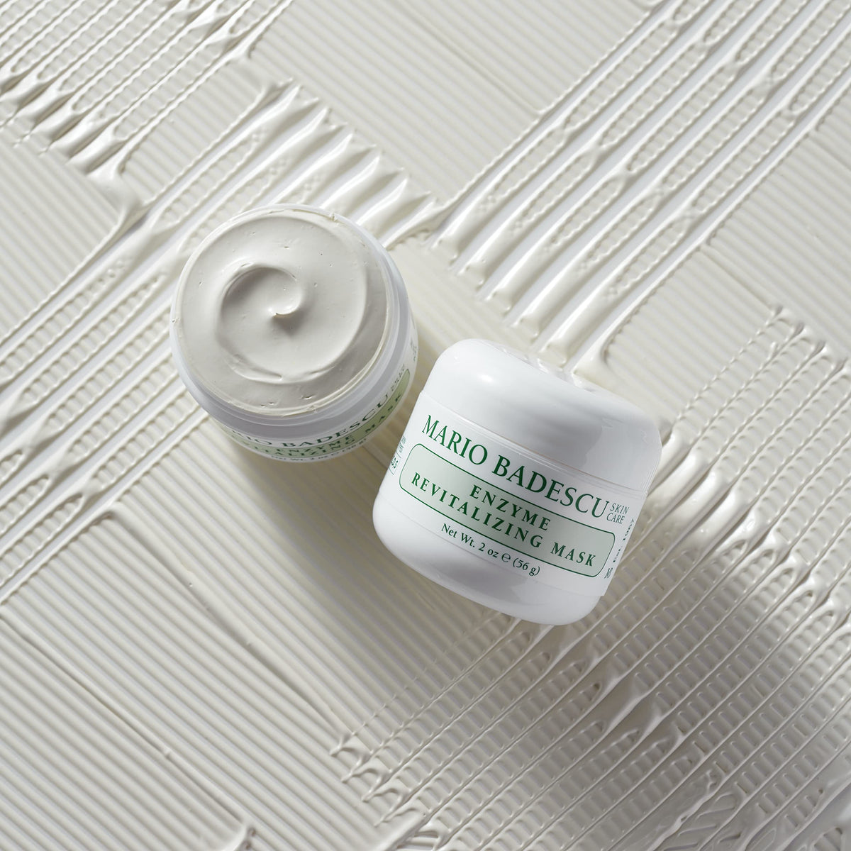 Mario Badescu being applied to cheek demonstrating gentle exfoliation and hydration
