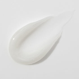Mario Badescu balm applied under lipstick showing seamless layering and smooth finish