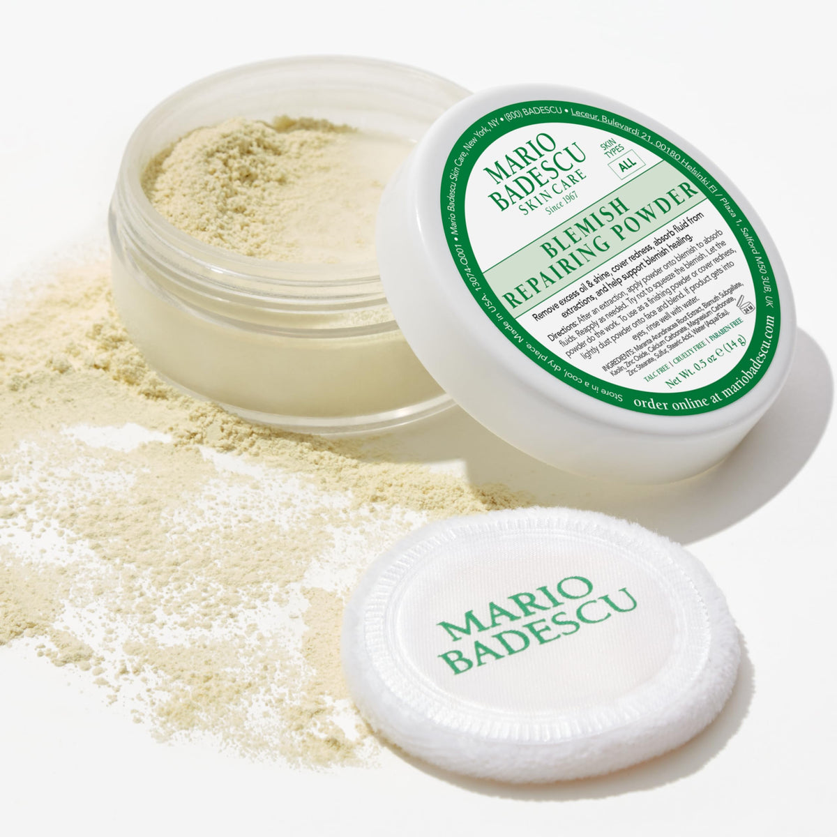 Mario Badescu powder in hand showing small 0.5 oz size for travel