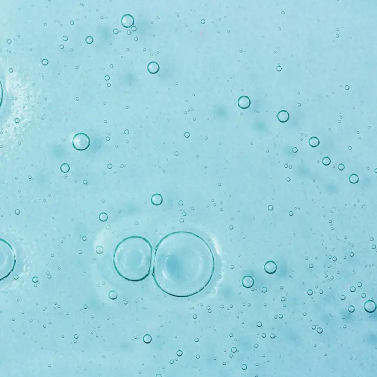 Mario Badescu body wash in use on wet skin with sponge demonstrating calming cleanse