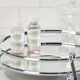 Mario Badescu bottle on bathroom shelf suggesting easy nightly skincare use