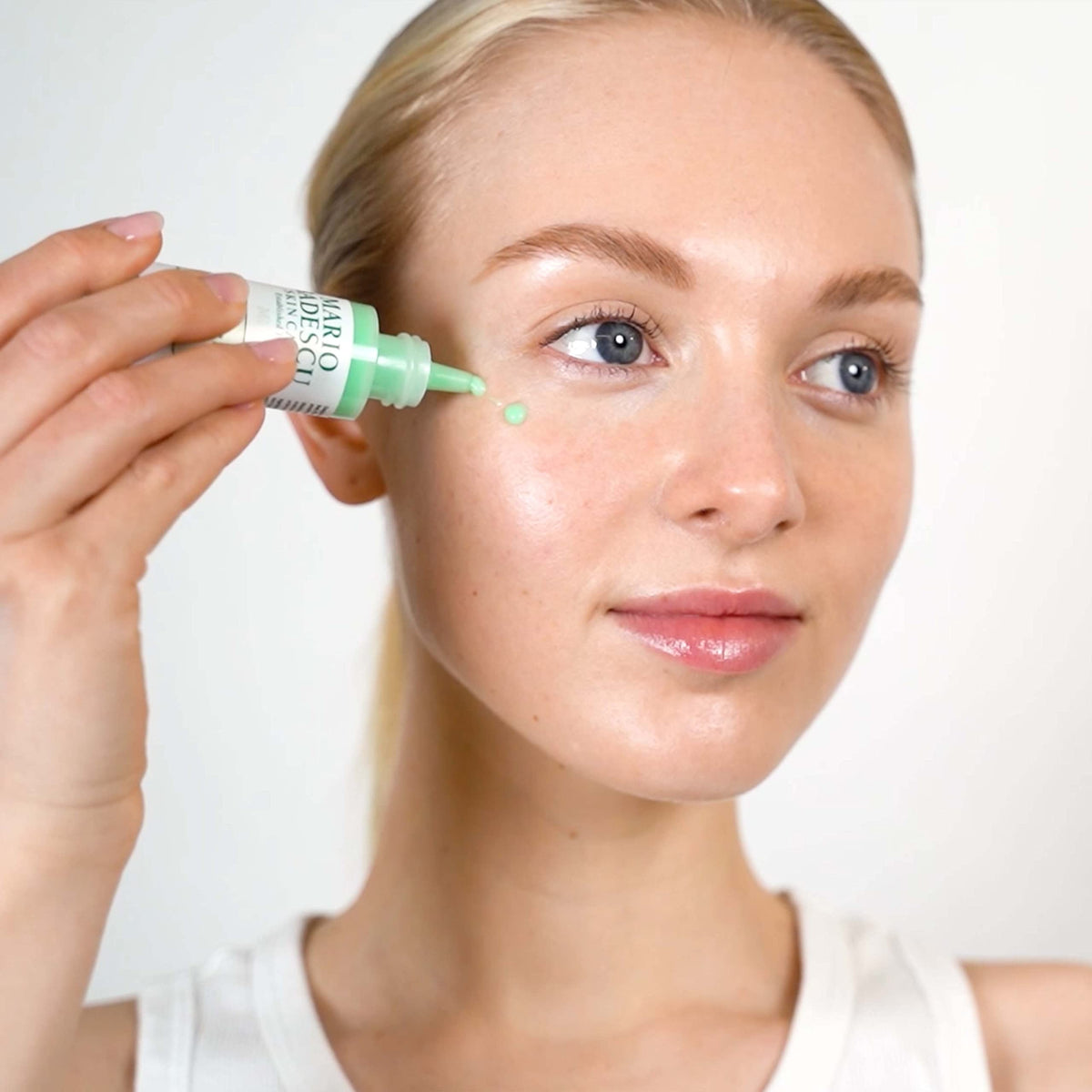 Mario Badescu serum texture swirled on hand showing lightweight blend and quick absorption