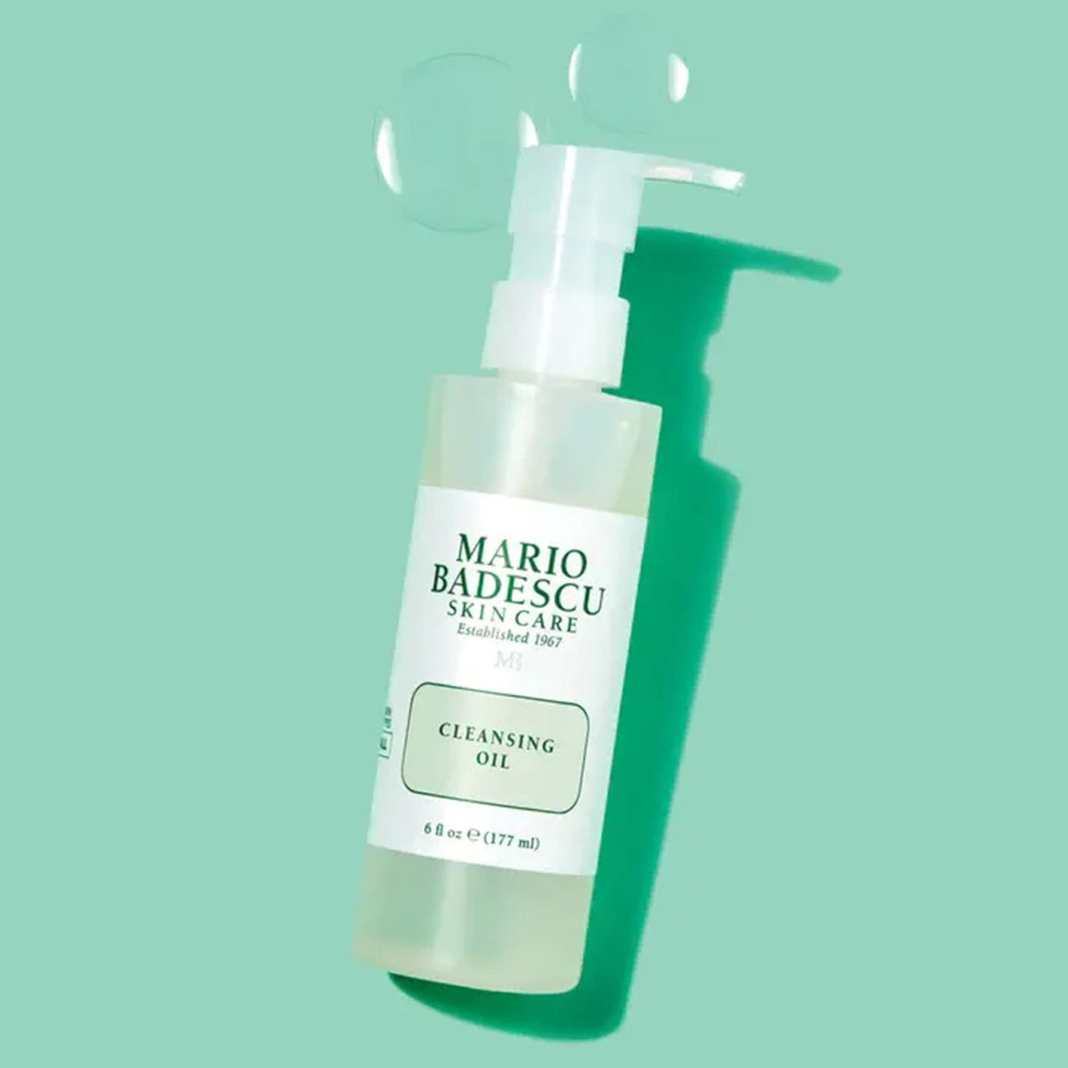 Mario Badescu pump dispensing oil illustrating easy one to two pump dosing benefit
