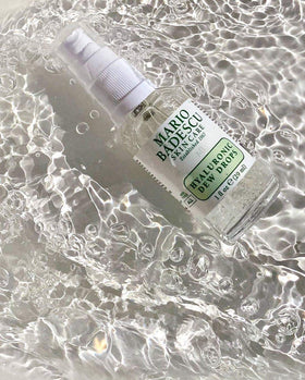 Mario Badescu applied on hand showing quick absorption and dewy, non-greasy result