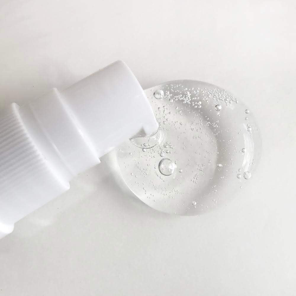 Mario Badescu next to a one-ounce measure for clear size and ounce reference benefit