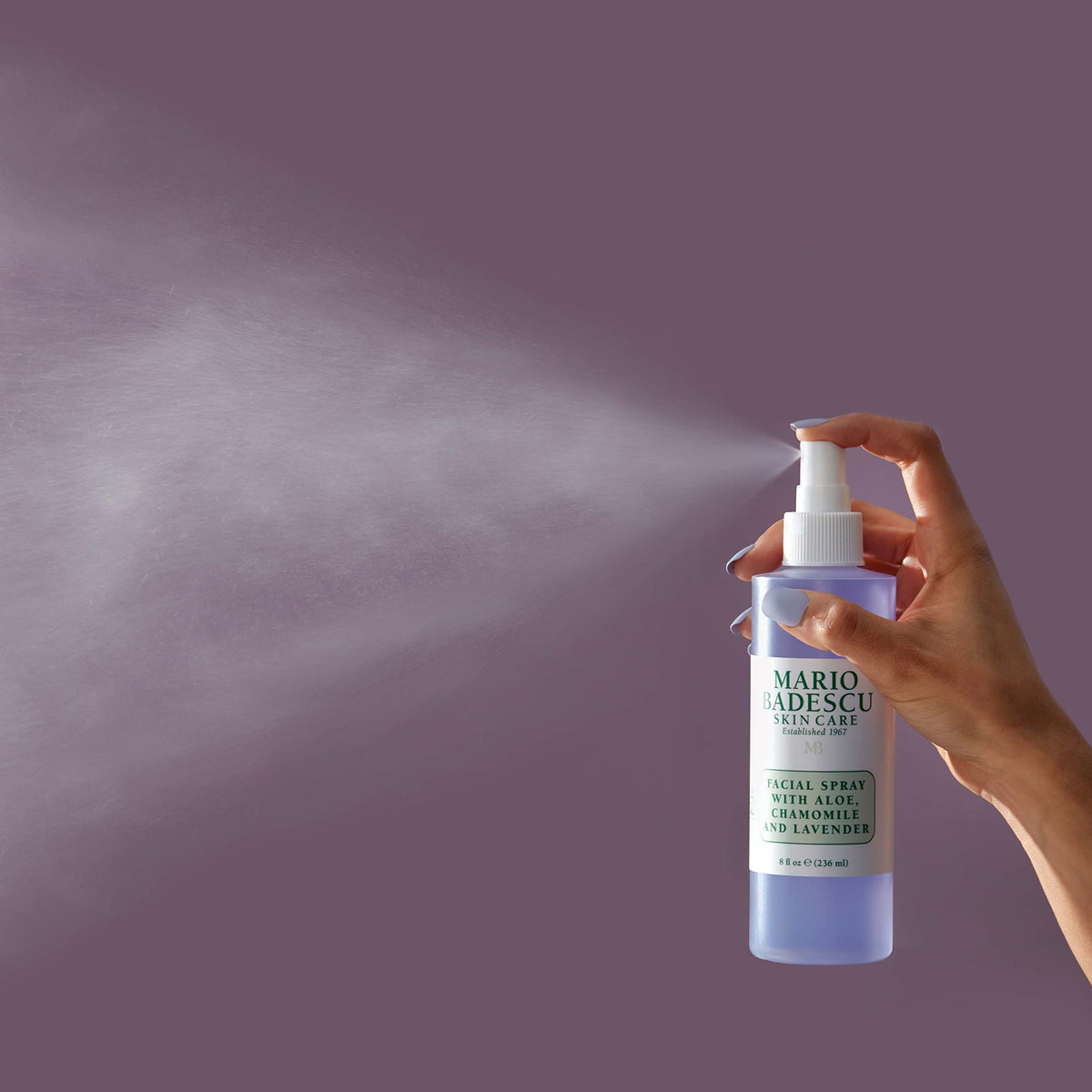 Mario Badescu mist spraying fine vapor demonstrating even application benefit