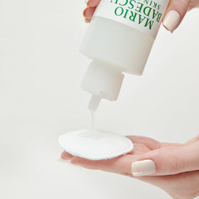 Mario Badescu product applied on hand demonstrating easy absorption and plumpness
