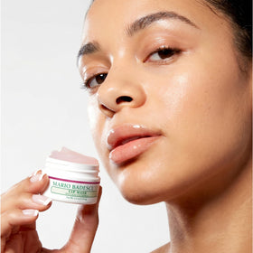 Mario Badescu ingredients flatlay with acai and coconut showing natural botanicals