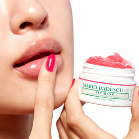 Mario Badescu open jar revealing glossy lip mask for overnight nourishment