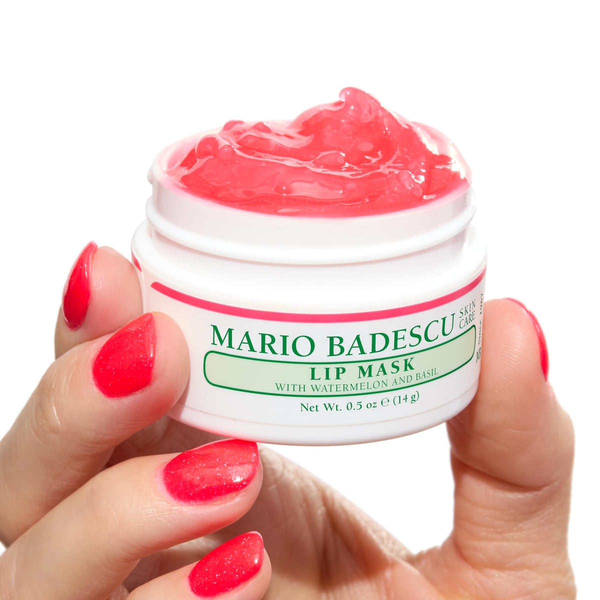 Mario Badescu applying lip mask on lips to restore softness and smoothness