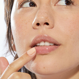 Mario Badescu open jar texture close-up illustrating rich, smooth balm