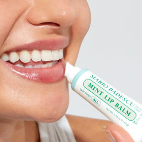 Mario Badescu Original lip balm tube closeup displaying smooth balm and application ease