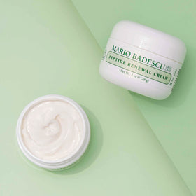 Mario Badescu one ounce jar next to coin, clarifies product size and scale