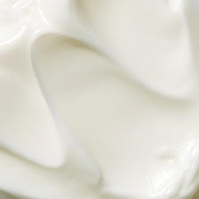 Mario Badescu cream applied on hand demonstrating nourishing finish