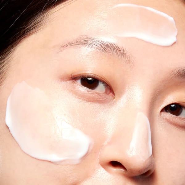 Mario Badescu jar on bedside table suggesting overnight skin recovery