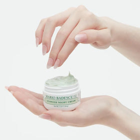 Mario Badescu night cream on bathroom shelf in routine setting promoting restful skin care