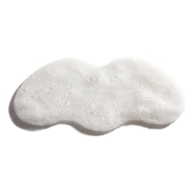 Mario Badescu patch next to hand for scale showing compact convenience benefit