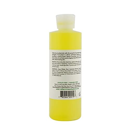 Mario Badescu lotion poured on hand showing lightweight texture and absorbency benefit