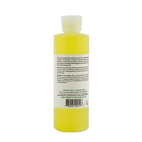 Mario Badescu lotion poured on hand showing lightweight texture and absorbency benefit