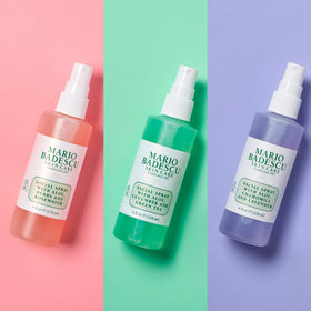 Mario Badescu sprays in hand for size comparison and travel convenience